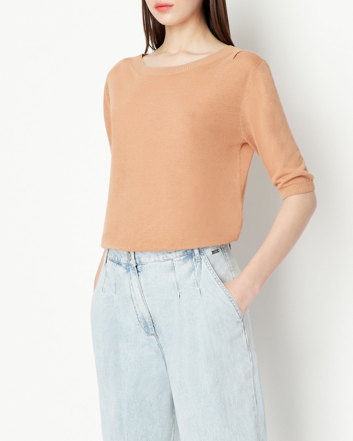 Woman knitted pullover, brush