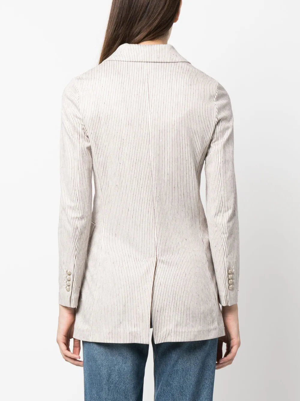 Woman D. breasted, brunette